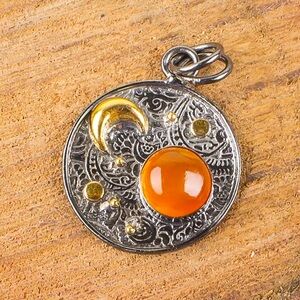 SOLD! Carnelian on a 925 Sterling Silver with the moon, Sun, and Stars.